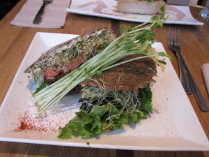 raw OM mushroom burger in chapati bread with kraut